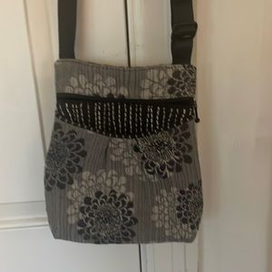 Maruca Handmade Crossbody bag. Easy access for phone Zip top, 24" adj strap